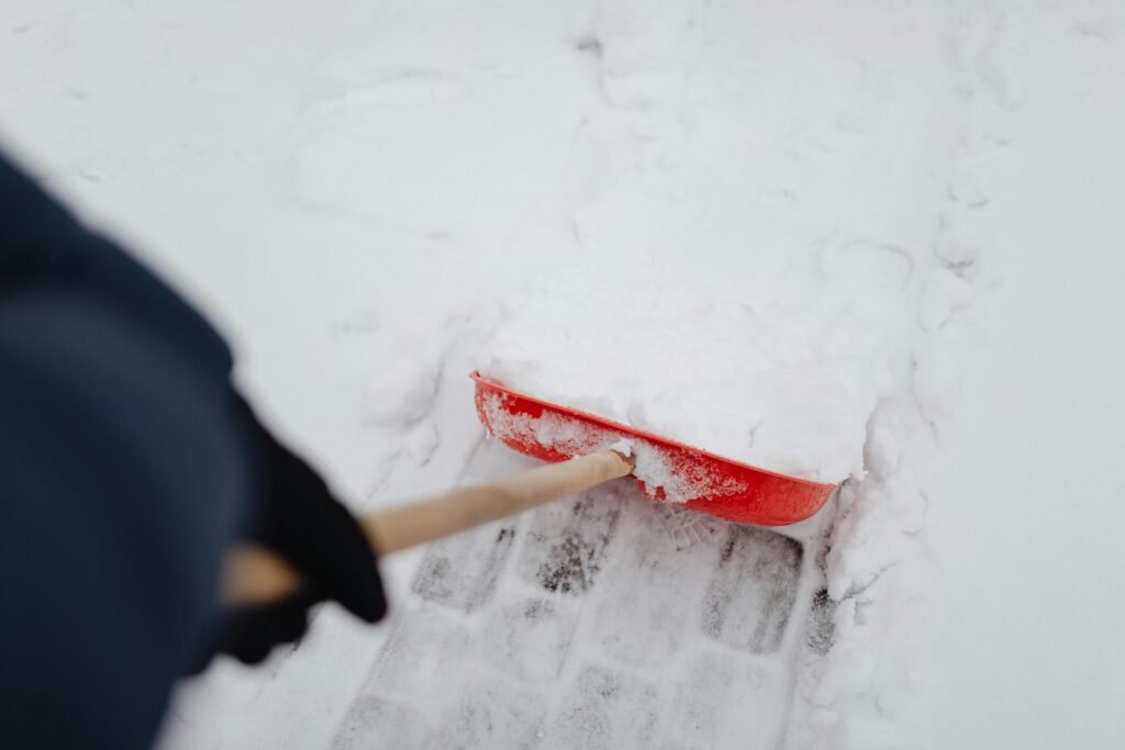 Snow shoveling in Grand County, CO, for safe walkways