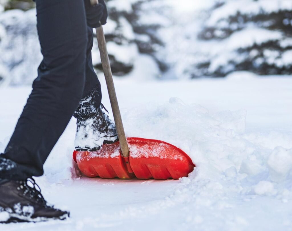 Snow shoveling in Fraser, CO, for clear residential driveways